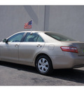 toyota camry 2009 tan sedan gasoline 4 cylinders front wheel drive automatic 79407