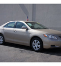 toyota camry 2009 tan sedan gasoline 4 cylinders front wheel drive automatic 79407