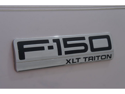 ford f 150 2006 white xlt gasoline 8 cylinders 4 wheel drive automatic 79407