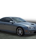 pontiac gto 2006 gray coupe gasoline 8 cylinders rear wheel drive automatic with overdrive 77037