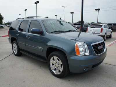 gmc yukon 2009 blue suv slt 8 cylinders automatic 76087