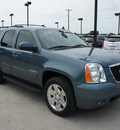 gmc yukon 2009 blue suv slt 8 cylinders automatic 76087