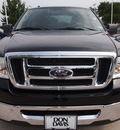 ford f 150 2008 black xlt 8 cylinders automatic with overdrive 76011