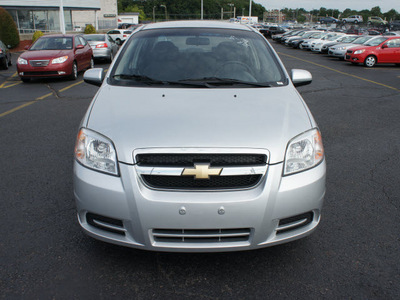 chevrolet aveo 2011 silver sedan lt gasoline 4 cylinders front wheel drive automatic 19153