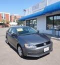 volkswagen jetta 2011 platinum grey metallic sedan 4 cylinders 6 speed automatic 90004