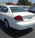 ford taurus 2004 vibrant white sedan se gasoline 6 cylinders front wheel drive automatic 45324