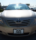 toyota camry 2007 tan sedan xle gasoline 4 cylinders front wheel drive automatic 76011