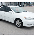 toyota camry 2005 white sedan xle v6 gasoline 6 cylinders front wheel drive automatic 76543