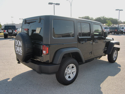 jeep wrangler unlimited 2012 black suv sport gasoline 6 cylinders 4 wheel drive automatic 76011