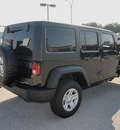 jeep wrangler unlimited 2012 black suv sport gasoline 6 cylinders 4 wheel drive automatic 76011