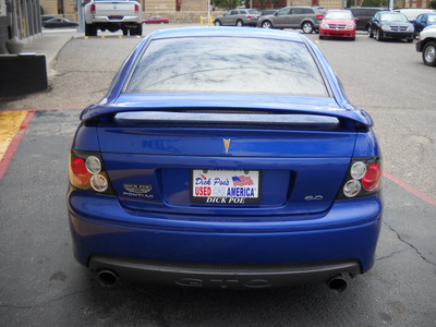 pontiac gto 2006 blue coupe gasoline 8 cylinders rear wheel drive standard 79925