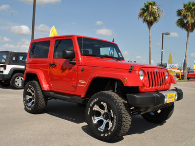 jeep wrangler 2011 red suv sahara gasoline 6 cylinders 4 wheel drive automatic with overdrive 78521