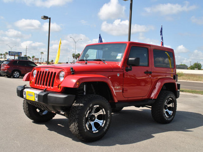 jeep wrangler 2011 red suv sahara gasoline 6 cylinders 4 wheel drive automatic with overdrive 78521