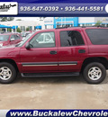 chevrolet tahoe 2004 red suv lt flex fuel 8 cylinders rear wheel drive automatic 77304