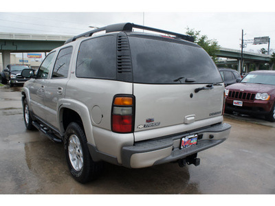 chevrolet tahoe 2005 silver suv gasoline 8 cylinders 4 wheel drive 4 speed automatic 77338