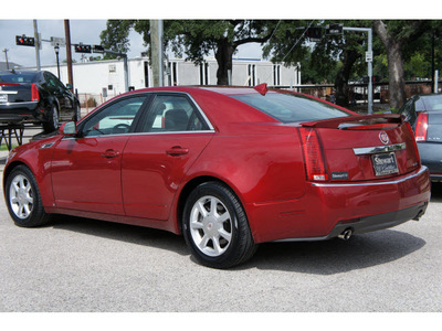 cadillac cts 2009 red sedan 3 6l v6 6 cylinders automatic 77002