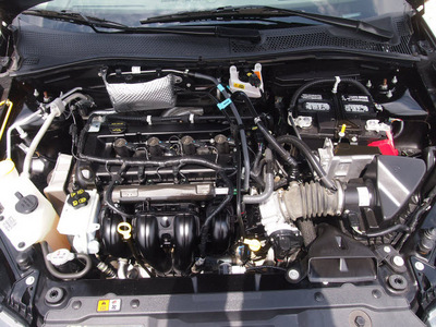 ford focus 2011 black sedan sport ses 4 cylinders automatic 76049