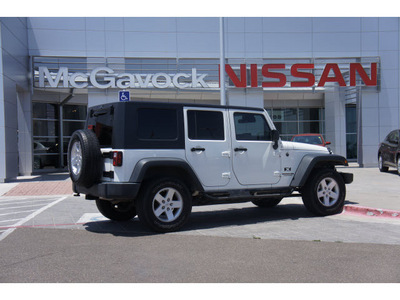 jeep wrangler unlimited 2009 white suv x 6 cylinders automatic 79119