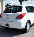 nissan versa 2011 white hatchback 1 8 s gasoline 4 cylinders front wheel drive automatic 75080