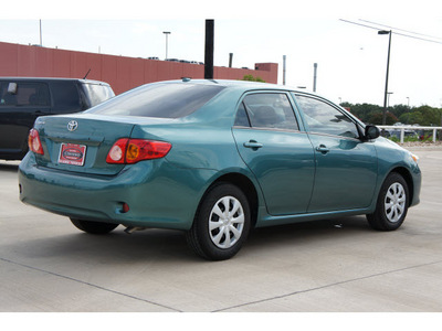 toyota corolla 2010 dk  green sedan gasoline 4 cylinders front wheel drive automatic 78232