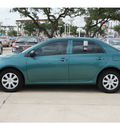 toyota corolla 2010 dk  green sedan gasoline 4 cylinders front wheel drive automatic 78232