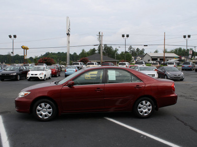 toyota camry 2002 red sedan le gasoline 4 cylinders front wheel drive automatic 27215