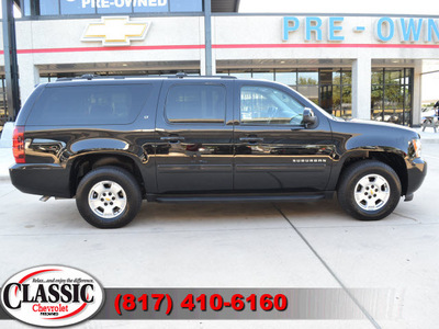 chevrolet suburban 2012 black suv lt 1500 w dvd flex fuel 8 cylinders 2 wheel drive automatic 76051