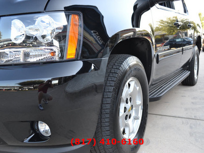 chevrolet suburban 2012 black suv lt 1500 w dvd flex fuel 8 cylinders 2 wheel drive automatic 76051