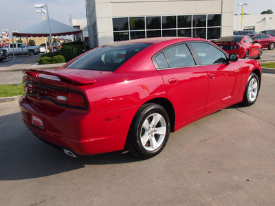 dodge charger 2011 maroon sedan 6 cylinders shiftable automatic 77388