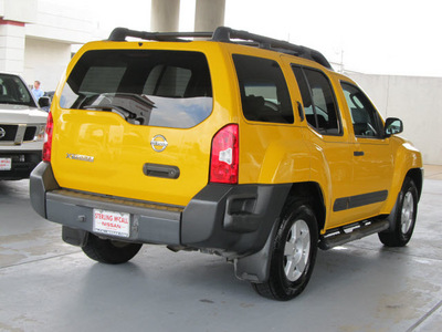 nissan xterra 2005 yellow suv se gasoline 6 cylinders rear wheel drive automatic with overdrive 77477