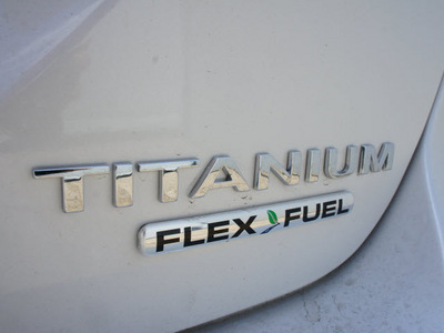 ford focus 2012 white hatchback titanium flex fuel 4 cylinders front wheel drive automatic 75235