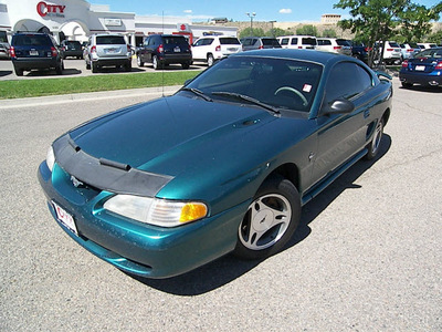 ford mustang 1998 green coupe gasoline v6 rear wheel drive automatic 81212