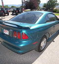 ford mustang 1998 green coupe gasoline v6 rear wheel drive automatic 81212