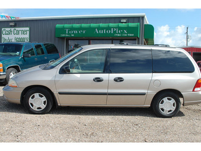 ford windstar 2003 gold van lx standard 6 cylinders automatic with overdrive 77575