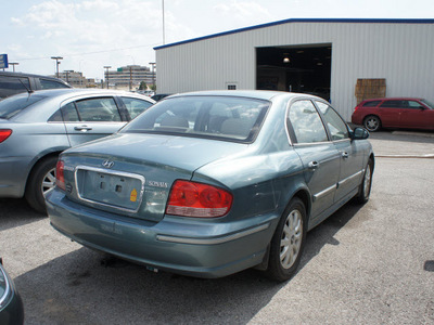 hyundai sonata 2004 blue sedan gls gasoline 6 cylinders front wheel drive automatic 75062