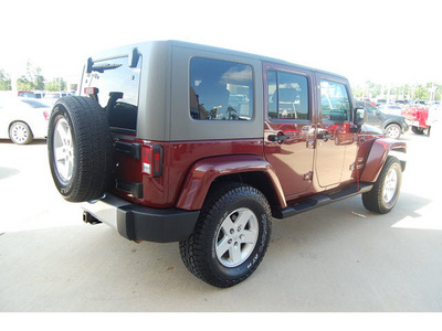 jeep wrangler unlimited 2007 red suv sahara gasoline 6 cylinders 4 wheel drive automatic with overdrive 77656
