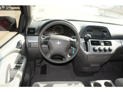 honda odyssey 2010 blue van lx gasoline 6 cylinders front wheel drive automatic 77034