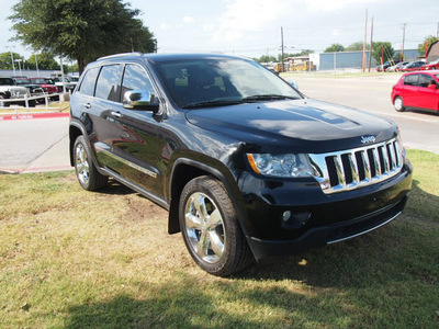 jeep grand cherokee 2011 black suv overland gasoline 8 cylinders 4 wheel drive automatic 75067