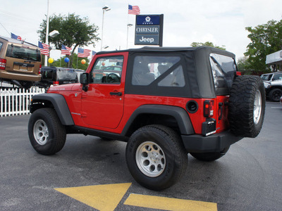 jeep wrangler 2010 red suv rubicon gasoline 6 cylinders 4 wheel drive 6 speed manual 33021