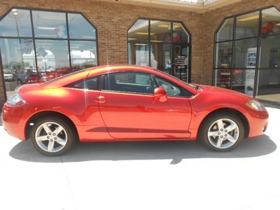 mitsubishi eclipse 2007 orange hatchback gasoline 4 cylinders front wheel drive not specified 43228