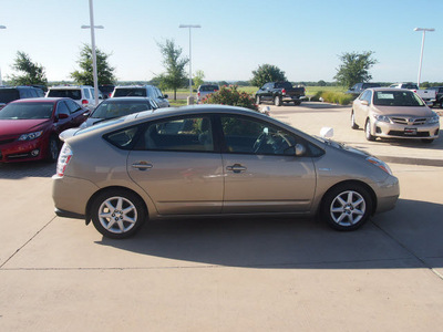 toyota prius 2009 tan hatchback touring hybrid 4 cylinders front wheel drive automatic 76049