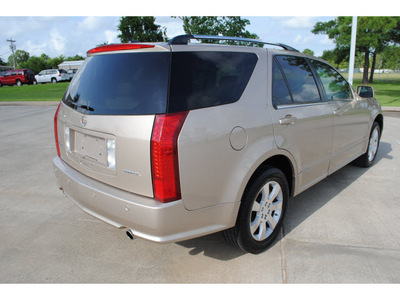 cadillac srx 2006 lt  brown suv gasoline 8 cylinders rear wheel drive automatic with overdrive 77539