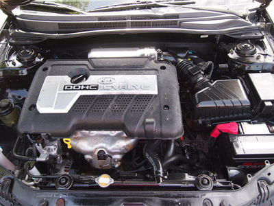 kia spectra 2006 black sedan ex gasoline 4 cylinders front wheel drive automatic 76011