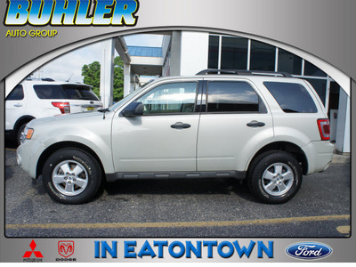 ford escape 2009 light sage suv xlt gasoline 6 cylinders 4 wheel drive automatic with overdrive 07724