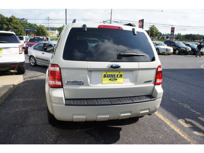 ford escape 2009 light sage suv xlt gasoline 6 cylinders 4 wheel drive automatic with overdrive 07724