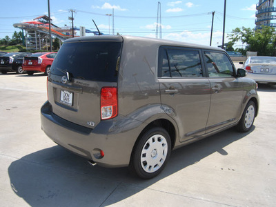 scion xb 2012 dk  green suv gasoline 4 cylinders front wheel drive automatic 76011