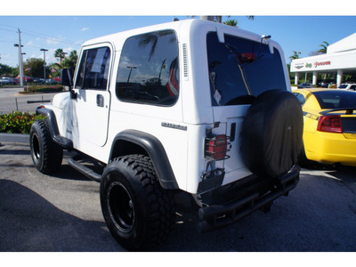 jeep wrangler 1990 white s gasoline 4 cylinders 4 wheel drive manual 33157