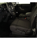 jeep wrangler 2011 black suv sport gasoline 6 cylinders 4 wheel drive 6 speed manual 77630