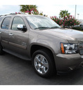 chevrolet tahoe 2011 brown suv ls flex fuel 8 cylinders 2 wheel drive automatic with overdrive 77581