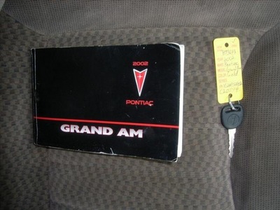pontiac grand am 2002 gold sedan gasoline 4 cylinders front wheel drive automatic 75964
